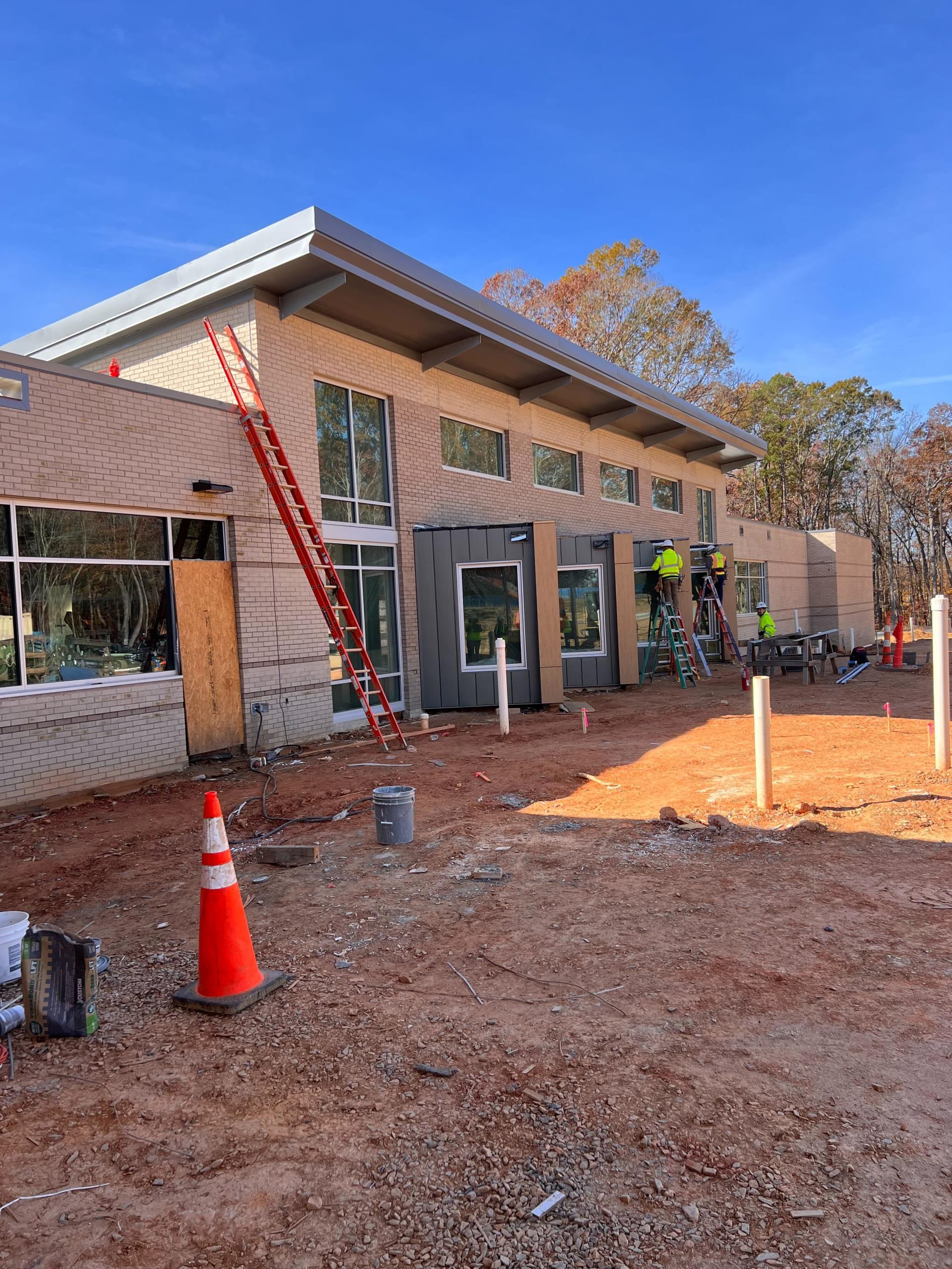 Photo of the SWRL under construction showing the exterior side of the building with construction workers busy at their trade.